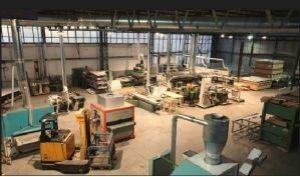 JZM HUIZEN , Timmerwerkplaats, hier worden huizen gemaakt